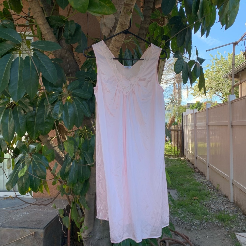 Light pink vintage semi sheer slip with lace detail!